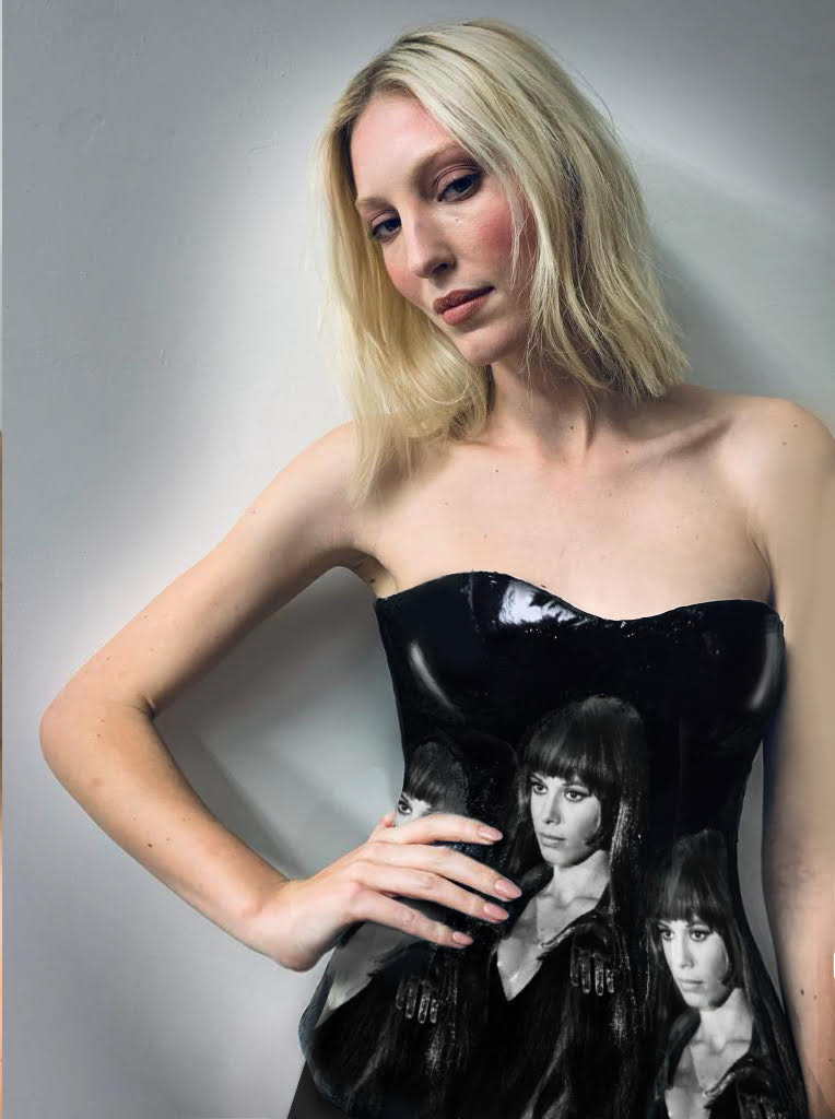 Ella Richards wearing a Deborah Brand corset featuring images of Anita Pallenberg. 
