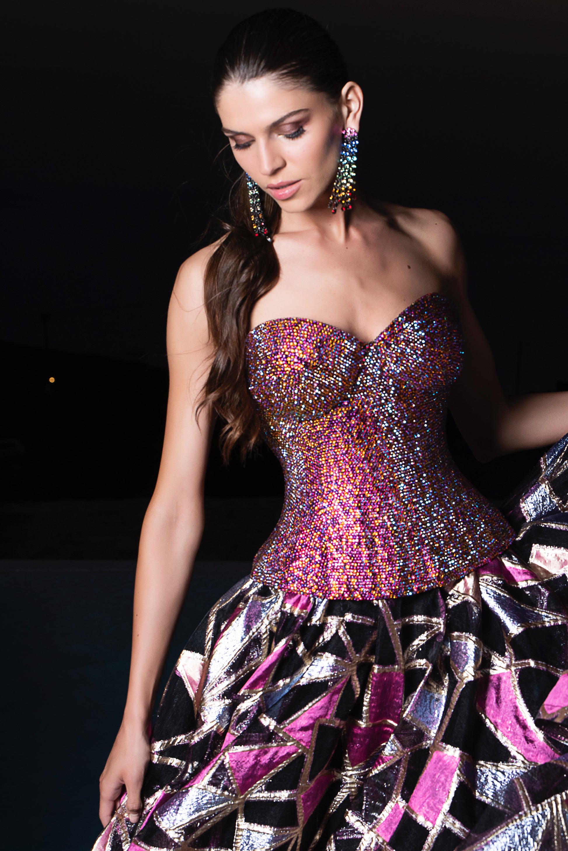 Close-up of a light-skinned female wearing a Swarovski crystal corset.